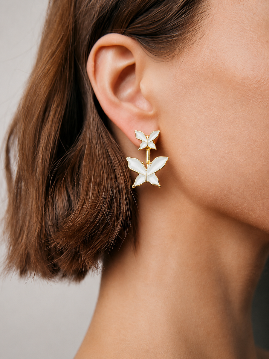 White butterfly drop earrings